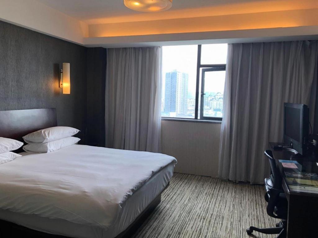 เอสเอสเอดับเบิลยู บูทิก โฮเต็ล ส้าวซิง Hotel เส้าซิง ภายนอก รูปภาพ